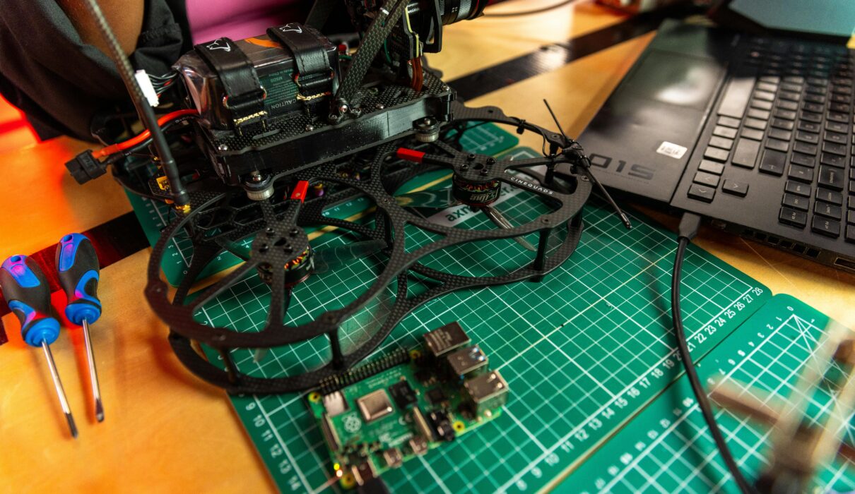 DIY drone kit build with FPV drone parts and soldering tools
